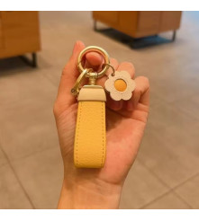 BAG CHARM FLOWER BUTTER YELLOW